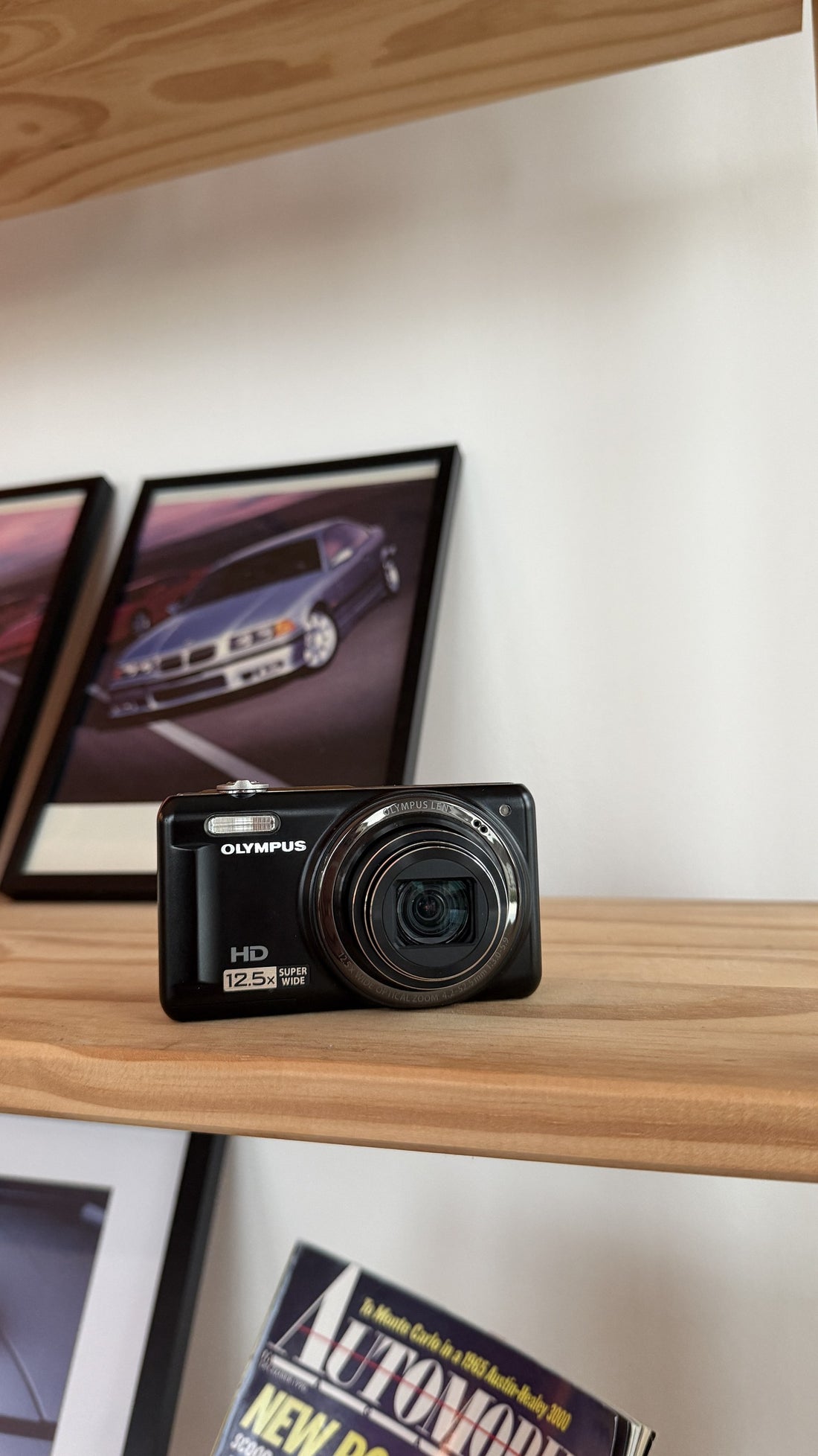 Olympus VR-320 14MP Digital Camera with 12.5x Super Wide Zoom front view