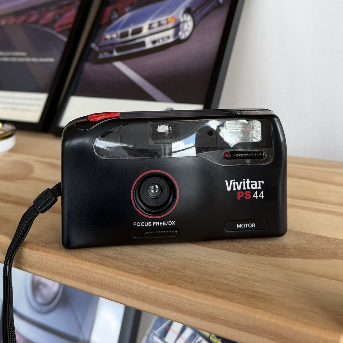Vivitar PS44 35mm point and shoot in black and red, front